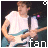 Pixelated image of a person playing electric guitar with red text overlay and partial white text at bottom, displayed as left frame in contact sheet layout.