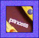 Animated sequence showing a brown surface with white text, yellow and brown objects, and three circular icons with symbols.