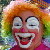 A pixelated clown face with orange hair and white makeup appears in the top-left quadrant, while blue text reads "GLOWS SCARE ME" above black text reading "DO THEY SCARE YOU?" on a white background.