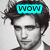 Black-and-white portrait of a person with tousled hair wearing a teal rectangular banner reading "WOW" above the head, set against a light gray background.