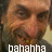 Pixelated close-up of a person's face with brown hair and eyes, wearing dark clothing against a blurred background, with white text reading 'bahaha' at the bottom.