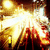 A pixelated explosion with bright yellow and white center transitioning to orange and red edges against dark background.