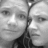 Two grayscale faces in close-up on left, pink background with pixelated text on right.