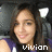 A person with long dark hair wearing a purple sleeveless top sits in a car seat with a white headrest, smiling at the camera with the name "vivian" displayed below.
