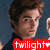 A pixelated image featuring a person with brown hair and dark clothing, multiple figures in the background, and red text reading 'twilight' on three separate sections.