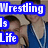 Two young men in blue wrestling singlets with white lanyards pose together, one with arm around the other, against a beige background with "Wrestling Is Life" text overlay.
