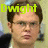 A pixelated image of a person with short brown hair and glasses, wearing a dark jacket over a light shirt, with text above the head.