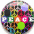 A circular icon with a colorful mosaic background featuring peace symbols and the word "PEACE" in block letters, surrounded by splattered paint effects.