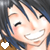 Pixelated anime-style icon of a smiling character with closed eyes, dark blue hair, and a white heart symbol in the bottom-left corner.