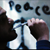 Two hands shake over a scale with 'Peace' text above, rendered in pixelated style.