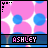 Pixelated icon with pink background, blue circles, white starbursts, and 'ASHLEY' text in black box.