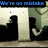 Animated sequence showing a figure in dark clothing with light hair against a striped background, transitioning from standing to sitting and back.