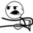 Pixelated black-and-white stick figure with circular head, two square eyes, and a thick mustache, holding a large curved object resembling a scythe or sickle.
