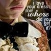 A close-up of a person wearing a white dress shirt and black bow tie with visible text overlay reading "i love your dress iron! where did you get it?".