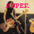 A pixelated image of a person playing drums with red text reading SUPER on the left and CHUNK on the right.