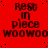 Red background with repeated black text 'Rest in piece' and 'WOO WOO' in pixelated font, arranged in a pattern with small black dots scattered across the surface