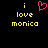 Pixelated yellow text 'i love monica' on black background with pink heart symbol above 'i'.