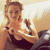 A pixelated image of a person with light brown hair in a dark top, positioned next to green text reading 'Original Icons .com' on a solid background.