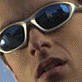 25 small images shows a person in various poses with sunglasses, a cap, and text overlays like 'Sexy!' and 'ey' on blue backgrounds
