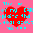 A static image with a bright pink background featuring four identical red hearts and cyan text reading 'The beat of my HEART explains the feel about you!!!!!!!'