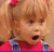 A split-frame image showing a pixelated child with blonde hair and red bow on the left, next to pink text reading "How Cute!" on black background.