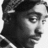 Black-and-white pixelated image of a person's face with a mustache, wearing a cap and striped collar, with text '2007' visible at the bottom right.