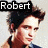 A pixelated image of a person with dark tousled hair wearing a black top, displayed in three with text labels above the first two