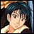 Pixelated anime-style character with dark green hair and light skin, wearing a white-collared shirt, positioned next to black background with silver text.