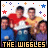 Four identical of a pixelated group photo with 'THE WIGGLES' text below, surrounded by colored stars and dots