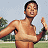 A pixelated image showing a shirtless person in motion on the left and green text reading "Original Icons .com" on a dark background to the right.