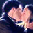 A 2x2 contact sheet of a four-frame animation showing two people kissing, with text overlays on black backgrounds and one gray panel.