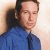 A 50x50 pixel animated contact sheet showing two frames of a David Duchovny icon with green text branding on the right side.