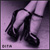 Pixelated image of a figure's lower body wearing black shoes and white socks against a purple gradient background with faint pixel clusters at bottom left.