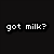 Black background with white pixelated text 'got milk?' next to a glass of milk being poured against a blue backdrop.