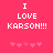 Pixelated text on a solid pink background with animated heart symbols below.