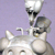 A pixelated static image of a grey pig with large ears and dark eyes, positioned against a light purple background.