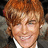 A pixelated image shows a person with light brown hair and a white-collared shirt on the left, next to blue text reading &i love my justin! on a black background.