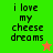 Green and orange pixelated background with text 'i love my cheese dreams' and a star icon.