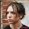 nine identical frames showing a person with dark hair against a brick wall, each frame containing the text 'my bitch' in red and white at the bottom