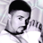 Static grayscale buddy icon of a man's face with short dark hair and beard, rendered in low-resolution pixel art style against light background.