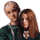 Two people in green hoodies with white drawstrings pose together; the woman's hair shifts from long brown to shorter dark brown across frames.
