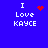 Blue background with white text reading "I Love KAYCE" and four variations of red pixel art symbols above the word "Love."