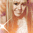 Pixelated image of a person with long light brown hair wearing a white top, set against a blue background with purple text.
