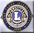 Two side-by-side circular icons display a stylized 'L' emblem with decorative borders; left icon has blue and gold elements, right icon is monochrome brown and gold.