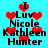 Pixelated text and red heart symbols on a cyan background, with animated heart movement.
