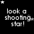 Black background with white pixelated text reading 'look a shooting star!' and scattered stars in various positions