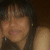 A person with dark hair and bangs appears in a of four , showing slight variations in facial expression and head position across the frames