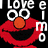 Two pixelated frames of a red Sesame Street character with orange nose and black mouth, featuring white text elements above the head on a black background.