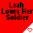 Red background with repeated black text "Leah Loves Her Soldier" and white triangular icons containing red pixelated hearts.