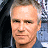 A 48x48 pixel buddy icon featuring a split composition with a person's face on the left and green text reading "Original Icons .com" on the right against a dark background.